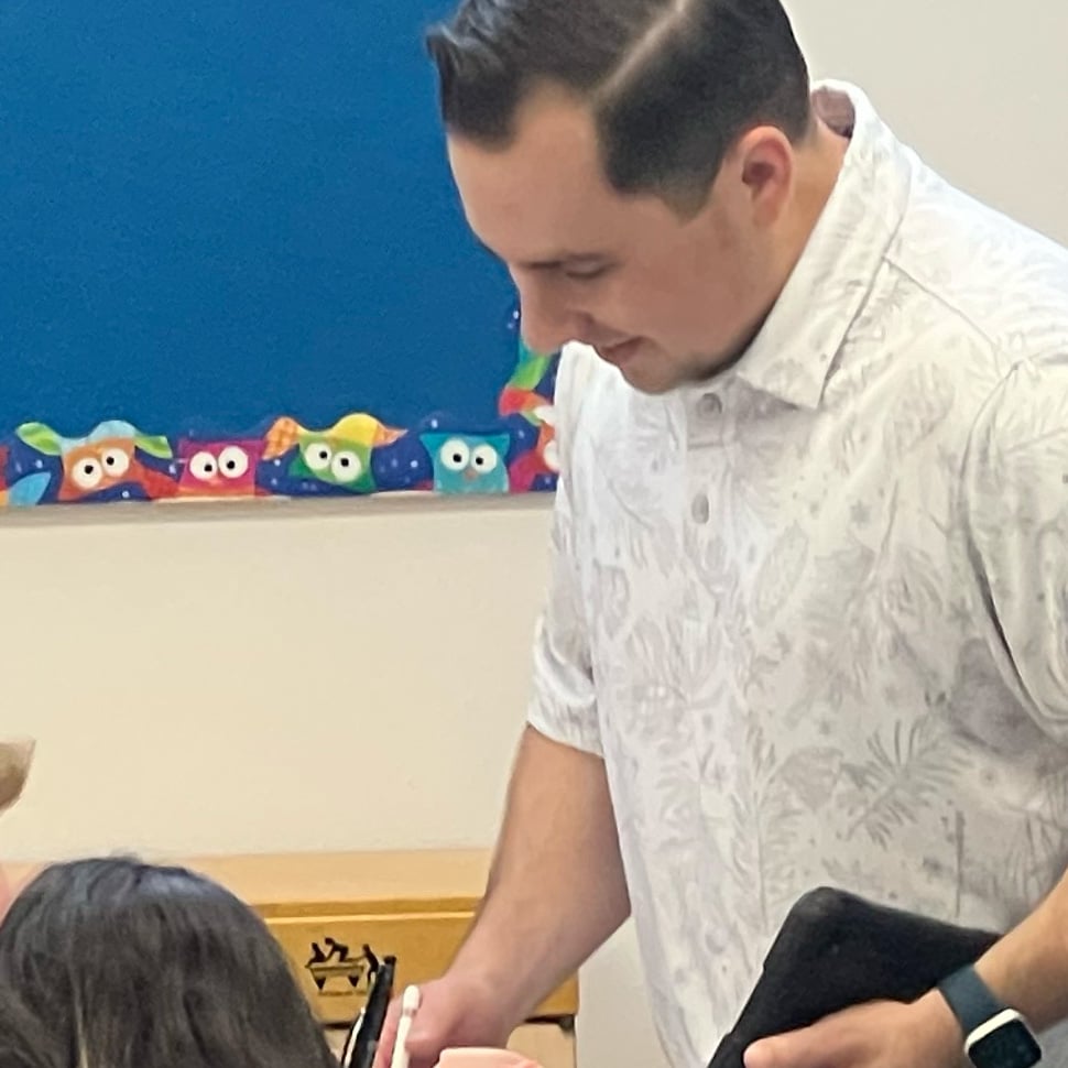Sheptin staff teaching a group of students